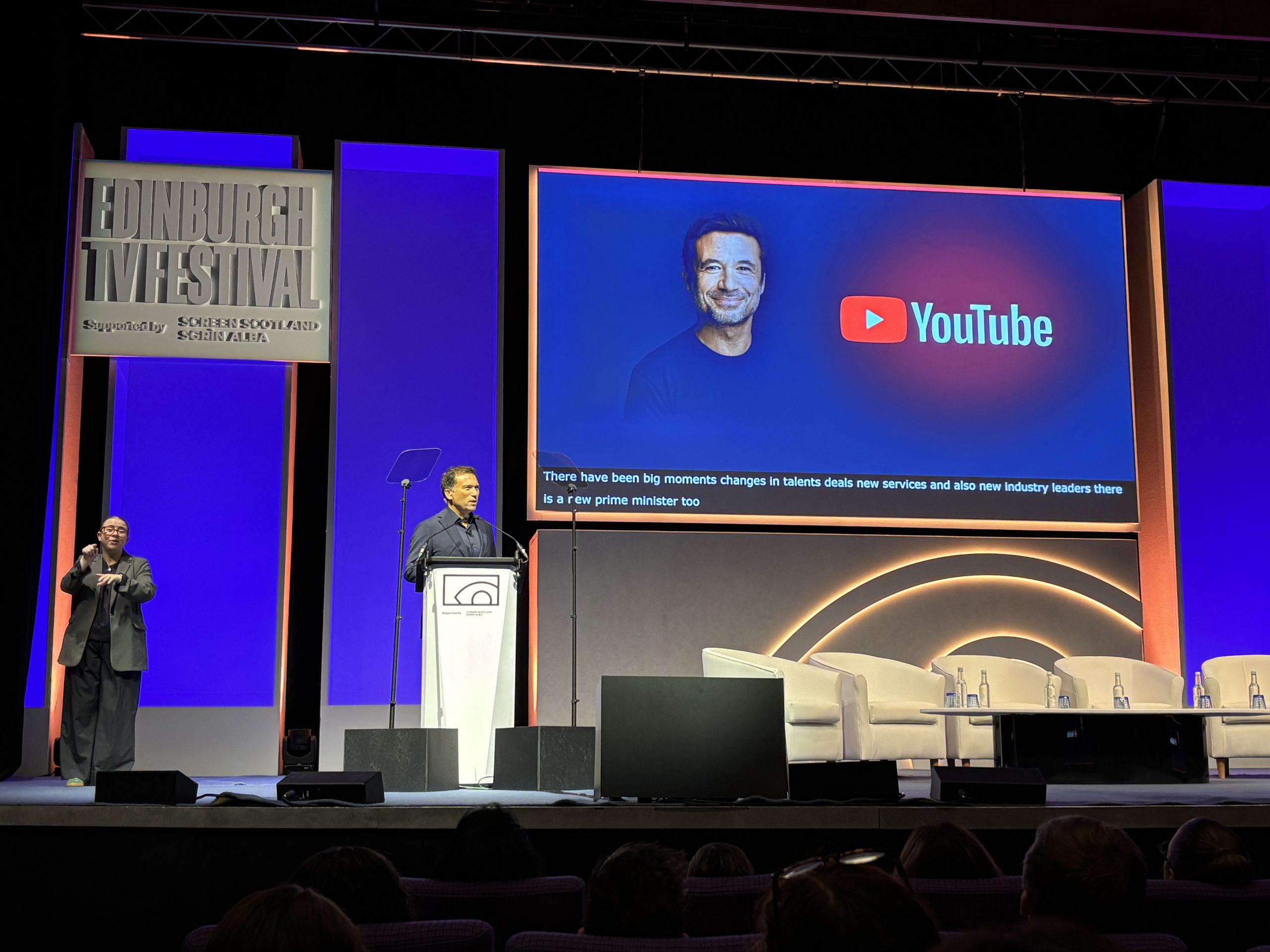 Opening Debate stage with Ros Atkins and showing Pedro Pina and YouTube slide